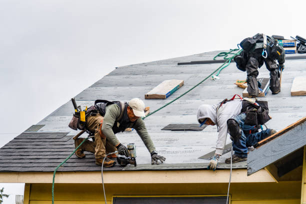 Professional Roofing technician working in Hart, TX